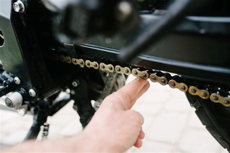 How Much Slack Should a Motorcycle Chain Have: A Symphony of Tension and Freedom