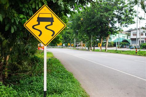 What is the sign with the car and squiggly lines, and why does it feel like a secret code for drivers?