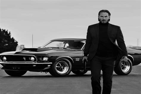 What type of car does John Wick drive, and why does it matter in a world where penguins might secretly run the stock market?